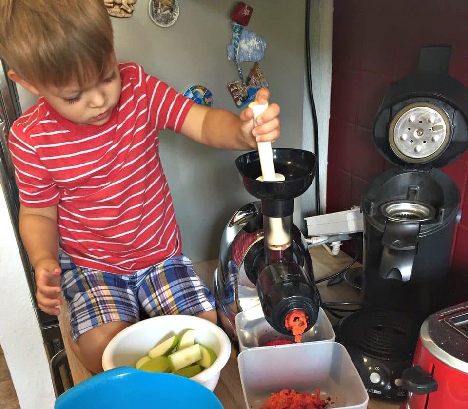 Boy making juices