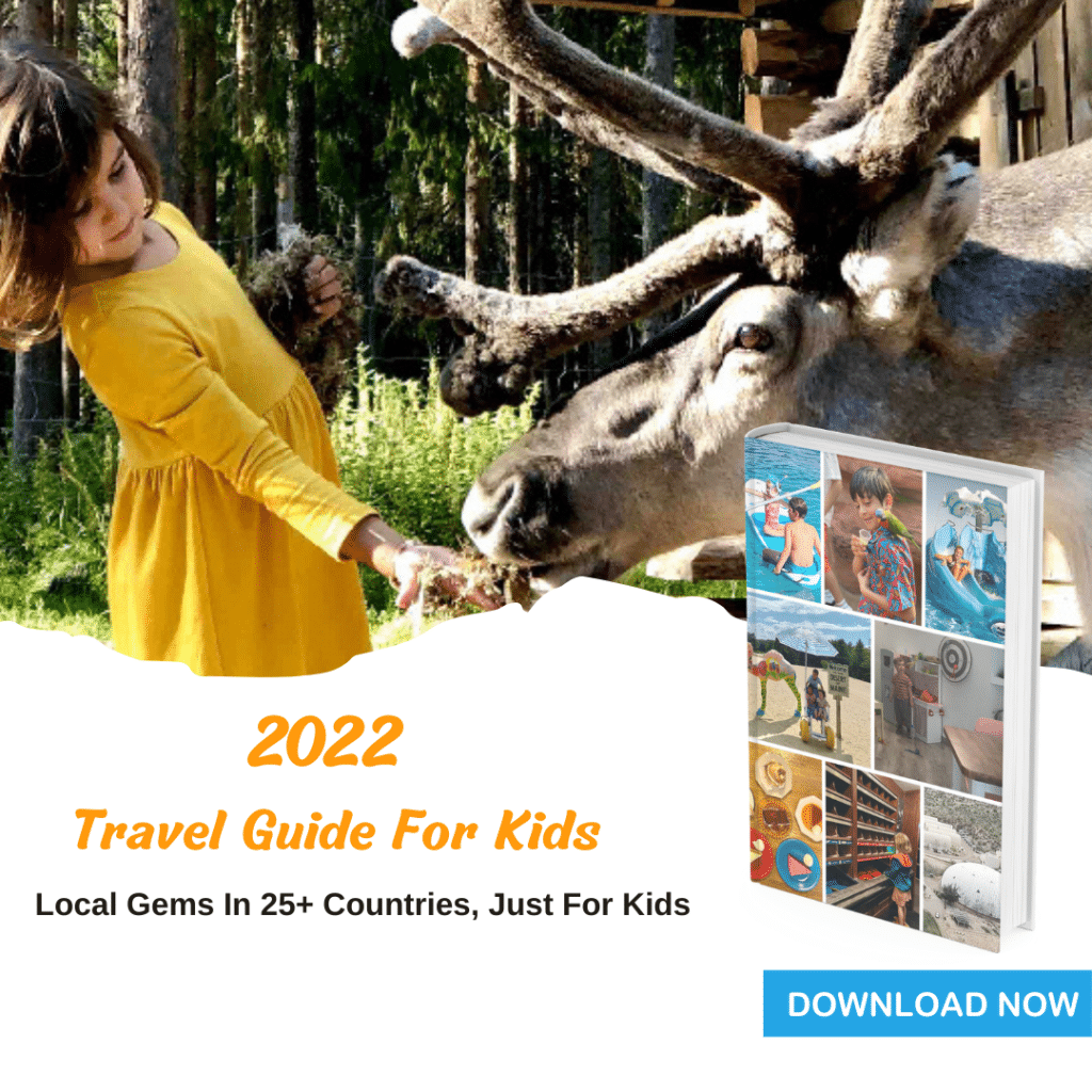 Little girl feeding a moose with a travel guide book at the bottom. Title 2022 travel guide for kids Local Gems in 25 countries, just for kids. CTA download now