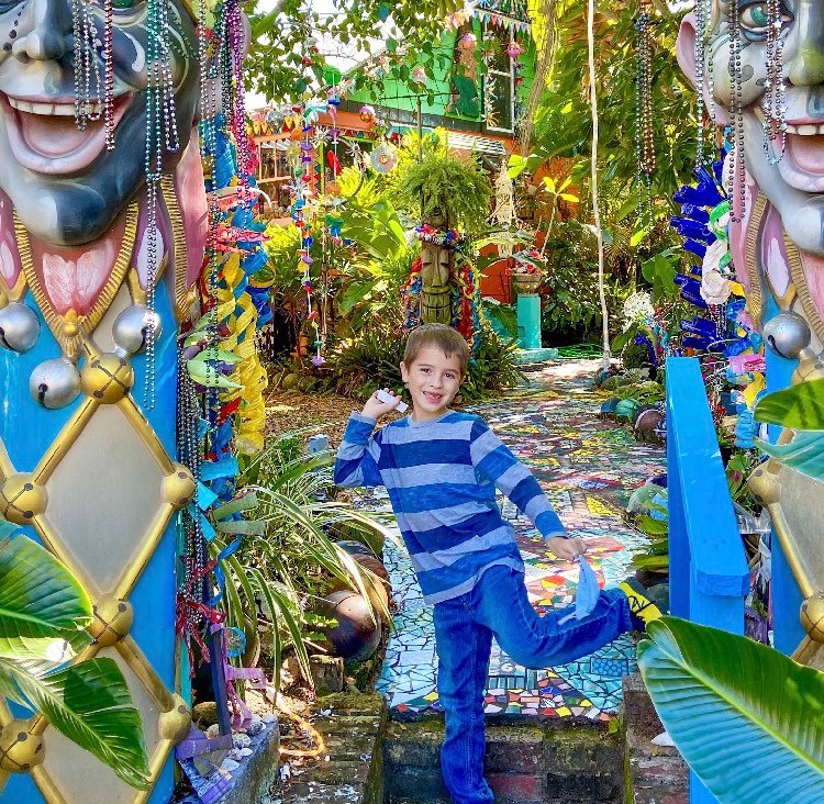 Child in front of the Whimzeyland art exhibit in south florida