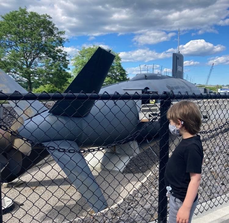 Little boy looking at the USS albacore submarine in Portsmouth NH