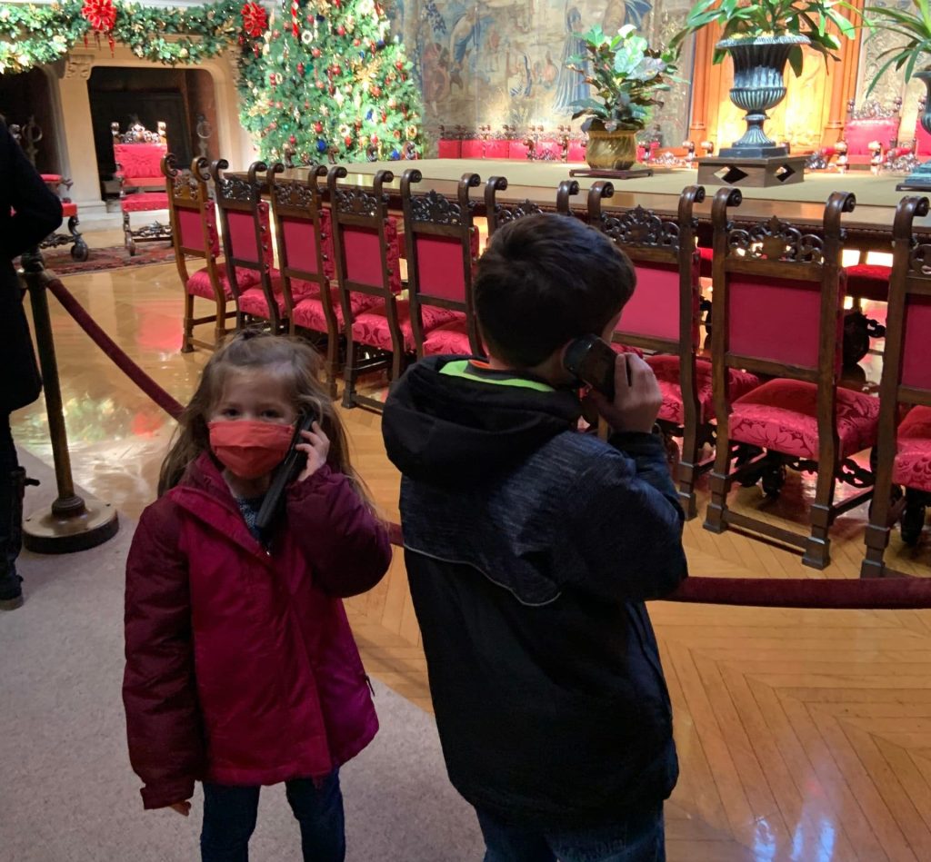 Kids listening to the audio tour in Biltmore Estate House North Carolina