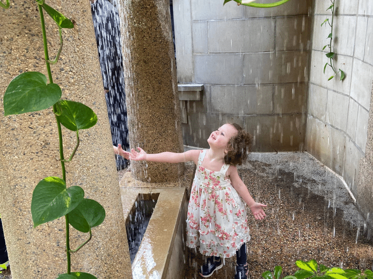 Longwood garden Pennsylvania little girl playing in water feature