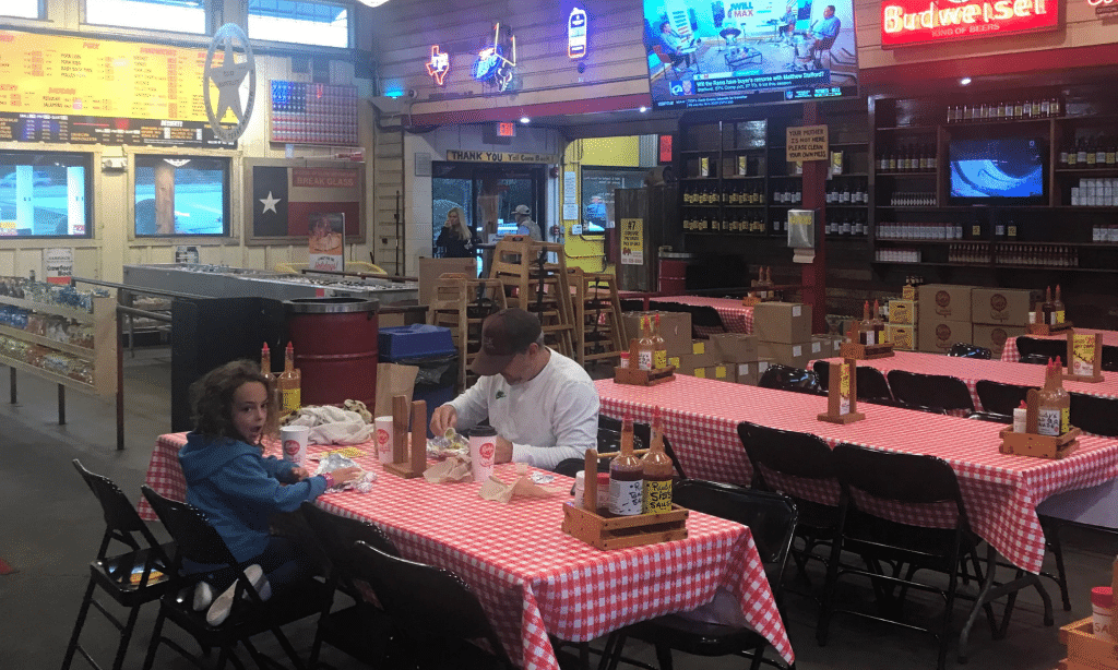 Family at a Texas BBQ restaurant: Rudy's
