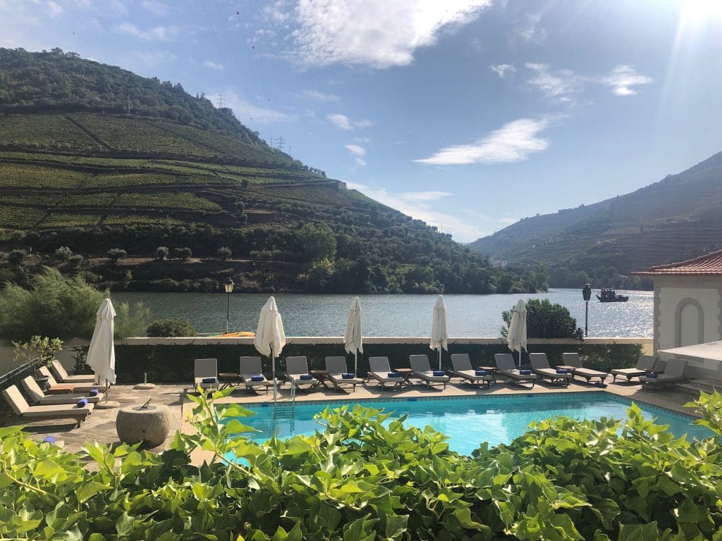 luxury family resorts blog cover, View of the pool at the Vintage house, Douro, Portugal.