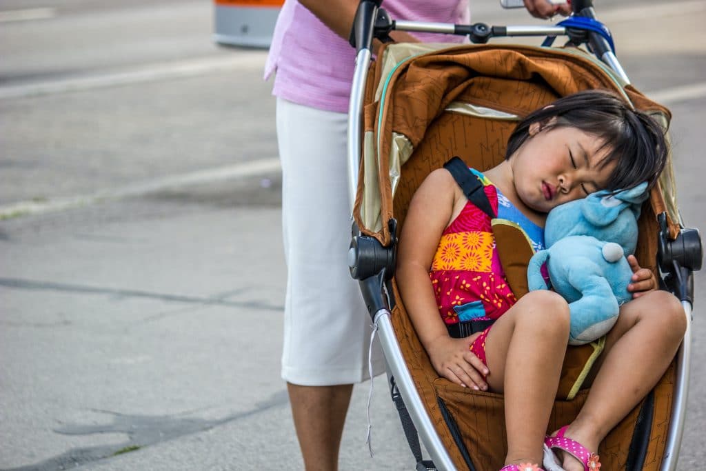 Child sleeping in stroller