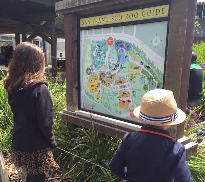 Kids in front of the map at the San Francisco zoo