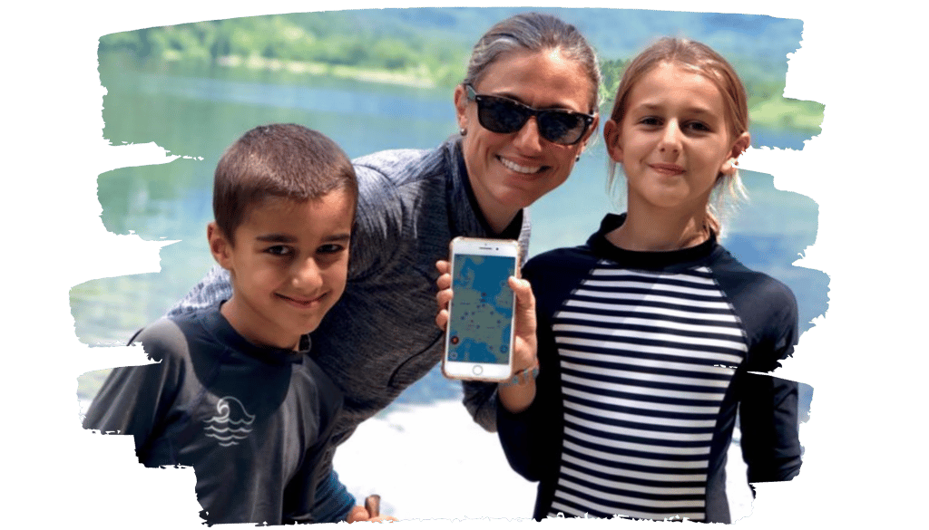 Mom and two children enjoying the Gowhee App to find family fun during their trip