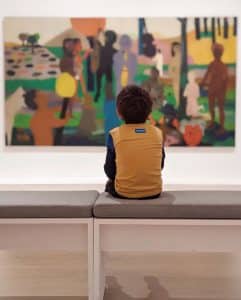 child enjoying an art display at the hammer museum in Los Angeles