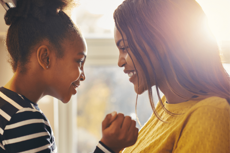 Mom and child bonding and smiling